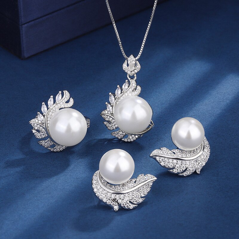 Charms-White-Pearl-Leaves-Angel-Wings-Necklace-Earrings-Adjustable-Ring-Women-s-Jewelry-Wedding-Gift-for.jpg